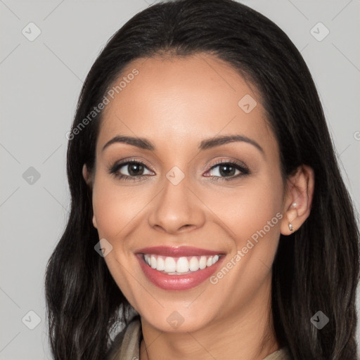 Joyful white young-adult female with long  black hair and brown eyes