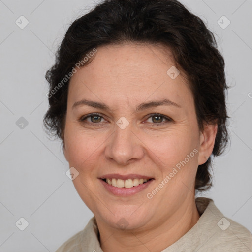 Joyful white adult female with short  brown hair and brown eyes