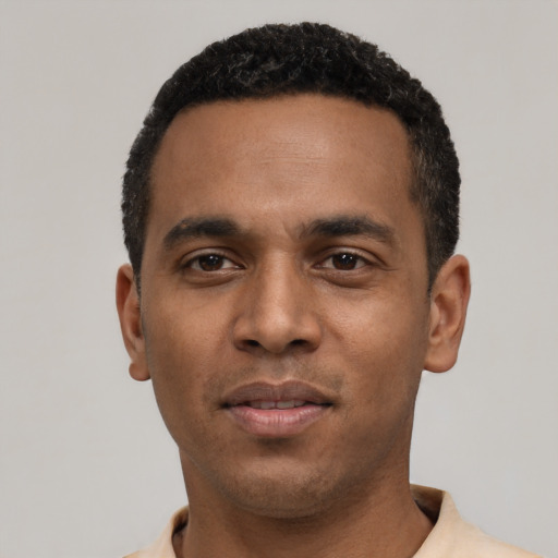 Neutral black young-adult male with short  black hair and brown eyes