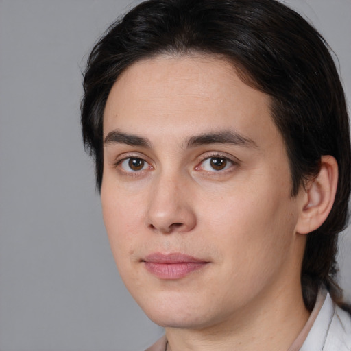 Joyful white young-adult male with medium  brown hair and brown eyes