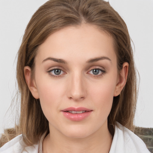 Neutral white young-adult female with medium  brown hair and grey eyes