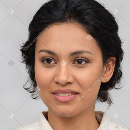 Joyful latino young-adult female with medium  brown hair and brown eyes