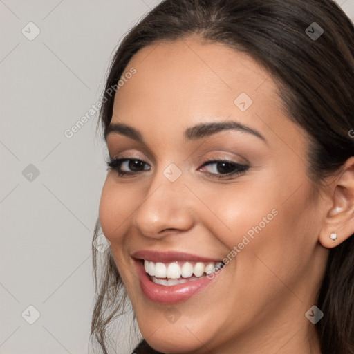 Joyful white young-adult female with long  brown hair and brown eyes