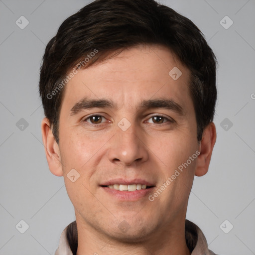 Joyful white young-adult male with short  brown hair and brown eyes