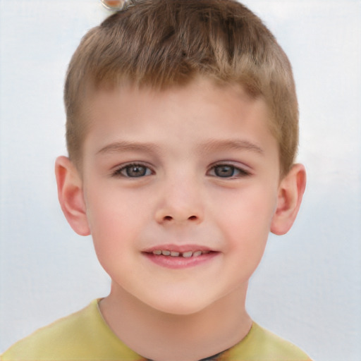 Joyful white child male with short  brown hair and brown eyes