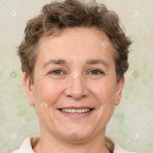 Joyful white adult female with short  brown hair and brown eyes