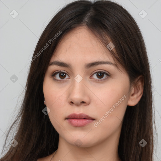 Neutral white young-adult female with long  brown hair and brown eyes