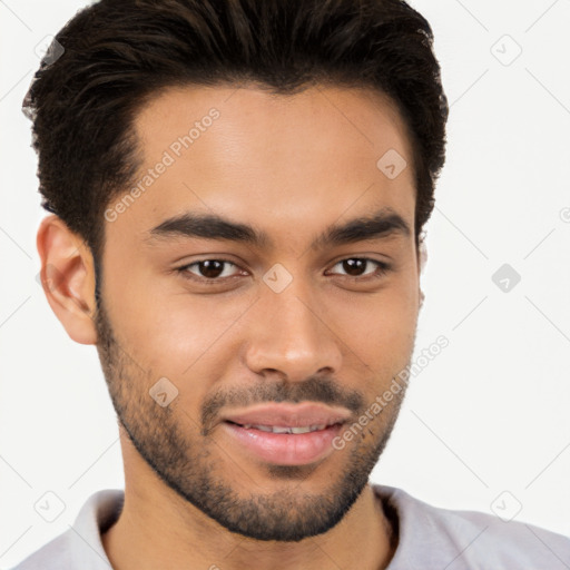 Joyful latino young-adult male with short  brown hair and brown eyes