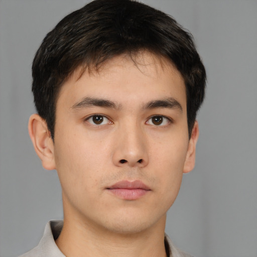 Neutral asian young-adult male with short  brown hair and brown eyes