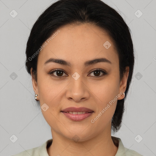 Joyful latino young-adult female with medium  black hair and brown eyes