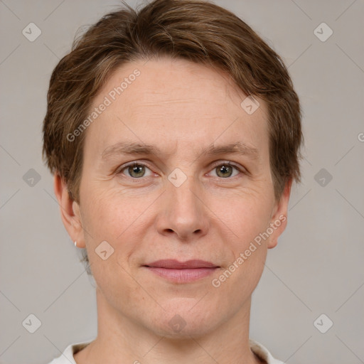 Joyful white adult male with short  brown hair and grey eyes