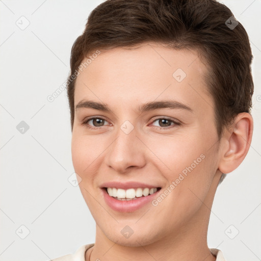 Joyful white young-adult female with short  brown hair and brown eyes