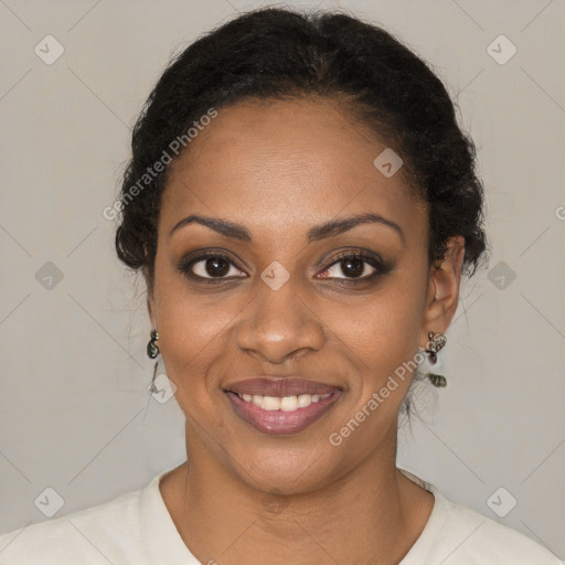 Joyful black young-adult female with short  brown hair and brown eyes