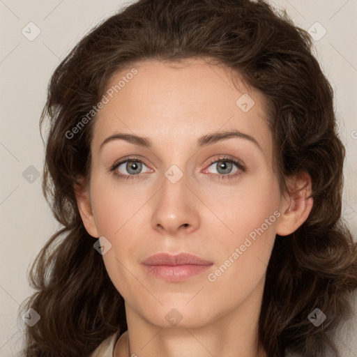 Joyful white young-adult female with long  brown hair and green eyes