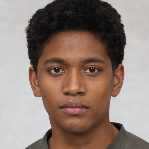 Neutral black young-adult male with short  brown hair and brown eyes