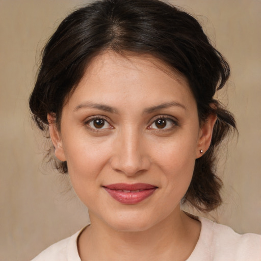 Joyful white young-adult female with medium  brown hair and brown eyes