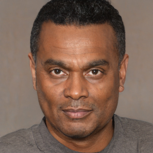 Neutral black adult male with short  black hair and brown eyes