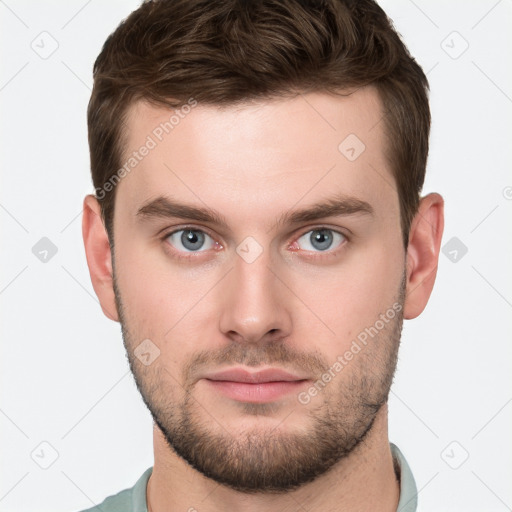 Neutral white young-adult male with short  brown hair and grey eyes