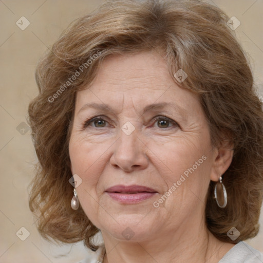 Joyful white middle-aged female with medium  brown hair and brown eyes