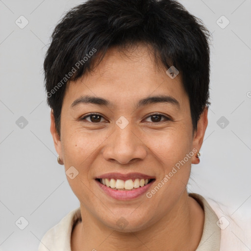 Joyful asian young-adult female with short  brown hair and brown eyes