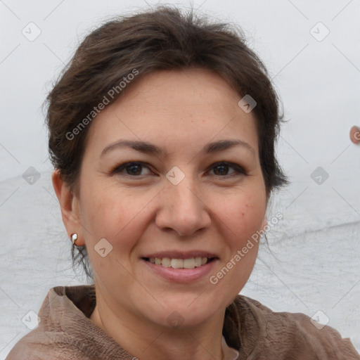 Joyful white adult female with short  brown hair and brown eyes