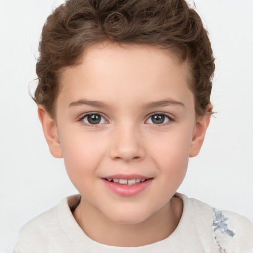 Joyful white child female with short  brown hair and brown eyes