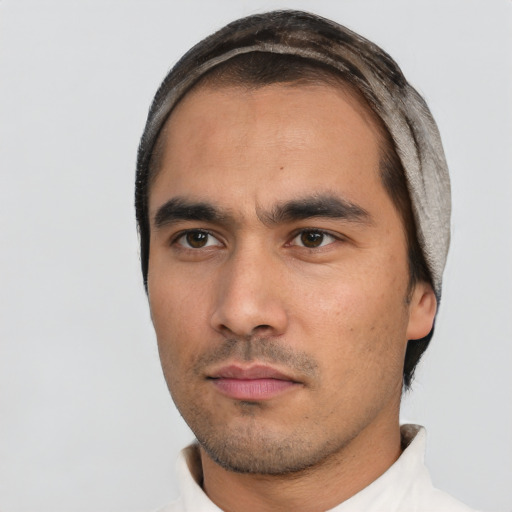 Neutral white young-adult male with short  black hair and brown eyes