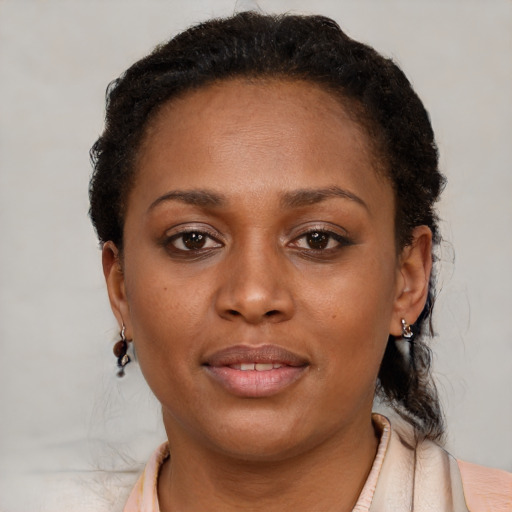 Neutral black young-adult female with short  brown hair and brown eyes