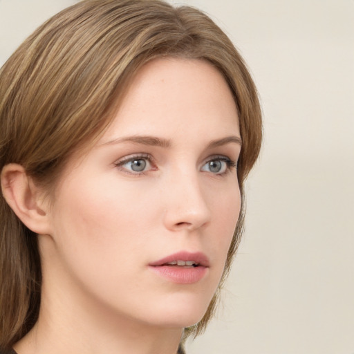 Neutral white young-adult female with long  brown hair and grey eyes