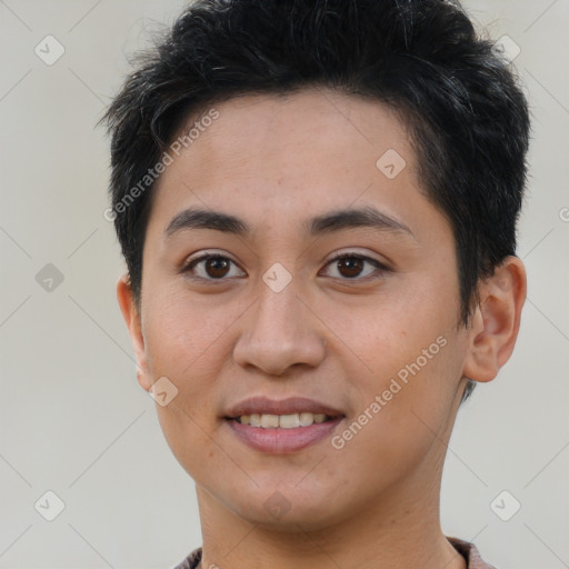 Joyful latino young-adult male with short  brown hair and brown eyes