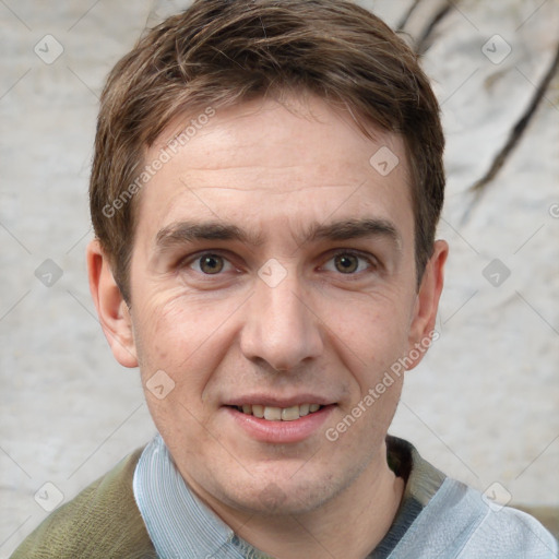 Joyful white adult male with short  brown hair and grey eyes