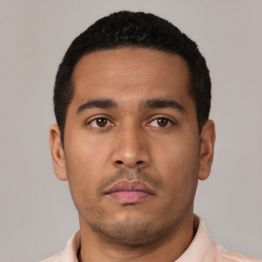 Neutral latino young-adult male with short  brown hair and brown eyes