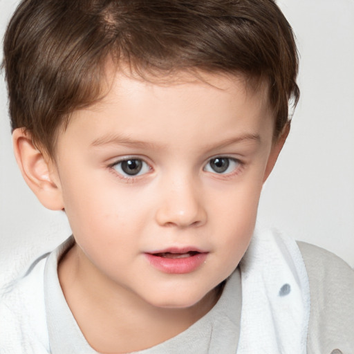 Neutral white child male with short  brown hair and brown eyes