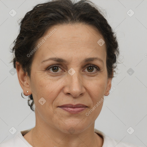 Joyful white adult female with short  brown hair and brown eyes