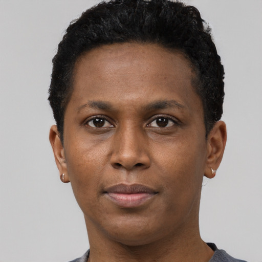 Neutral black young-adult male with short  brown hair and brown eyes