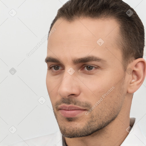 Neutral white young-adult male with short  brown hair and brown eyes