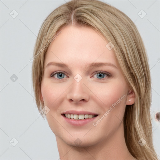 Joyful white young-adult female with medium  brown hair and blue eyes