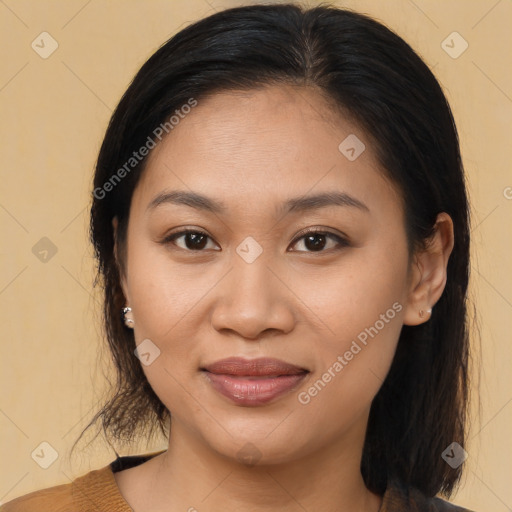 Joyful asian young-adult female with medium  brown hair and brown eyes