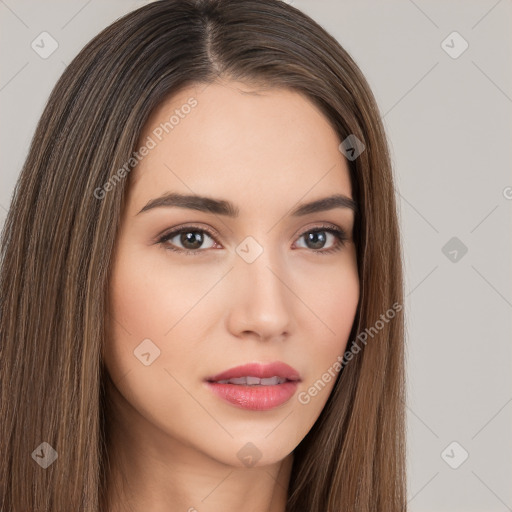 Neutral white young-adult female with long  brown hair and brown eyes