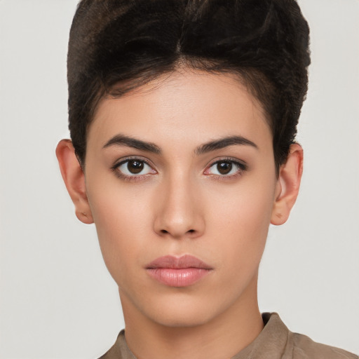 Neutral white young-adult female with short  brown hair and brown eyes