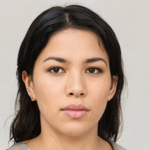 Neutral asian young-adult female with medium  brown hair and brown eyes