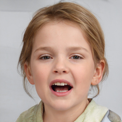 Joyful white child female with medium  brown hair and blue eyes