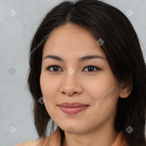 Joyful asian young-adult female with long  brown hair and brown eyes