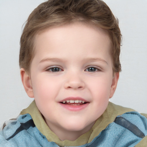 Joyful white child female with short  brown hair and blue eyes