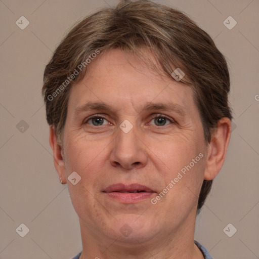 Joyful white adult male with short  brown hair and grey eyes