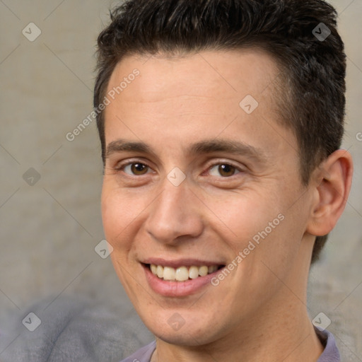 Joyful white adult male with short  brown hair and brown eyes