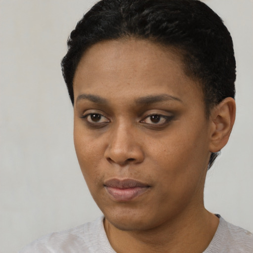 Neutral black young-adult female with short  black hair and brown eyes