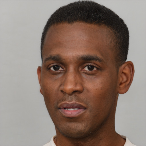 Neutral black young-adult male with short  brown hair and brown eyes