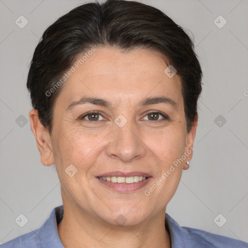 Joyful white adult female with short  brown hair and brown eyes