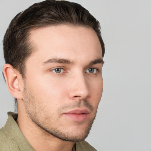 Neutral white young-adult male with short  brown hair and grey eyes